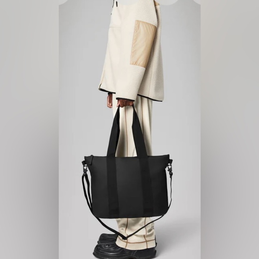 Brand new never used Rains tote bag mini in black